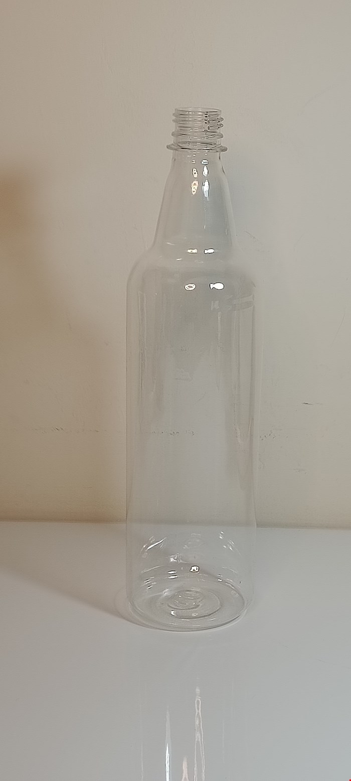 بطری 1 لیتری گرد 26.5 گرمی شفاف